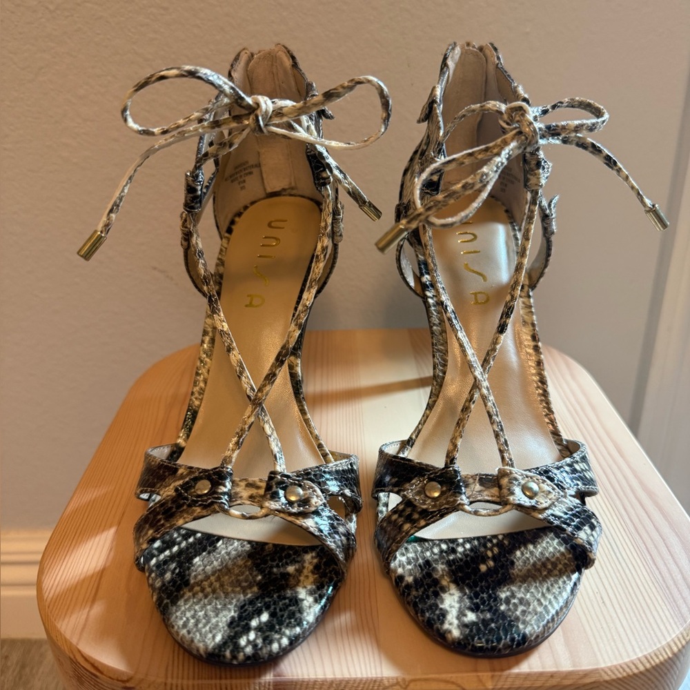 Unisa Snakeskin Lace-Up Heels in Black and Cream